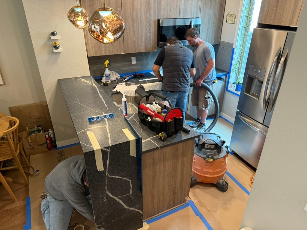 new granite countertops with waterfall feature during Portland kitchen remodel